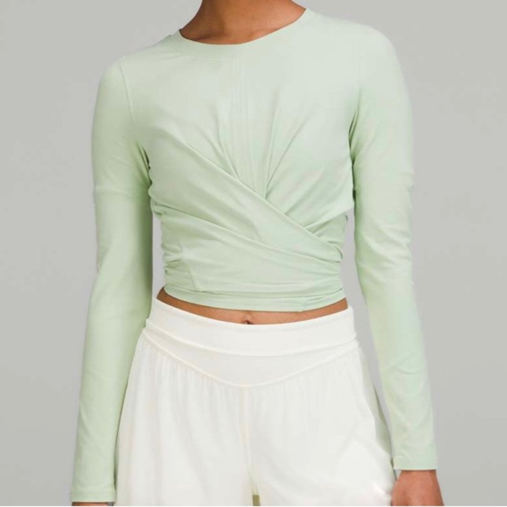 Lululemon Athletica Mint Green cropped, wrapped long sleeve shirt